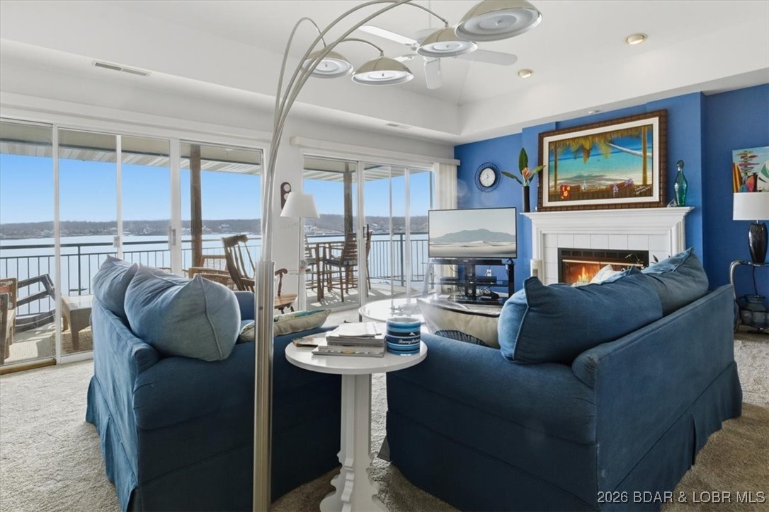 Wake up every morning to the stunning panoramic views at Palisades Condos, renowned for their exceptional waterfront location on Horseshoe Bend. This beautifully furnished top floor unit features 3 bedrooms and 3 full baths, offering 1,600 sq. ft. of open living space adorned with vaulted ceilings, creating an airy and inviting ambiance. This unit is turn-key, ready for you to move in and enjoy, BRAND NEW kitchen counter tops and refrigerator!! Additionally, it comes with a 16x40 boat slip and a PWC slip, all included in the price for your boating enjoyment. Don't miss the opportunity to experience this incredible property for yourself—schedule a showing today!