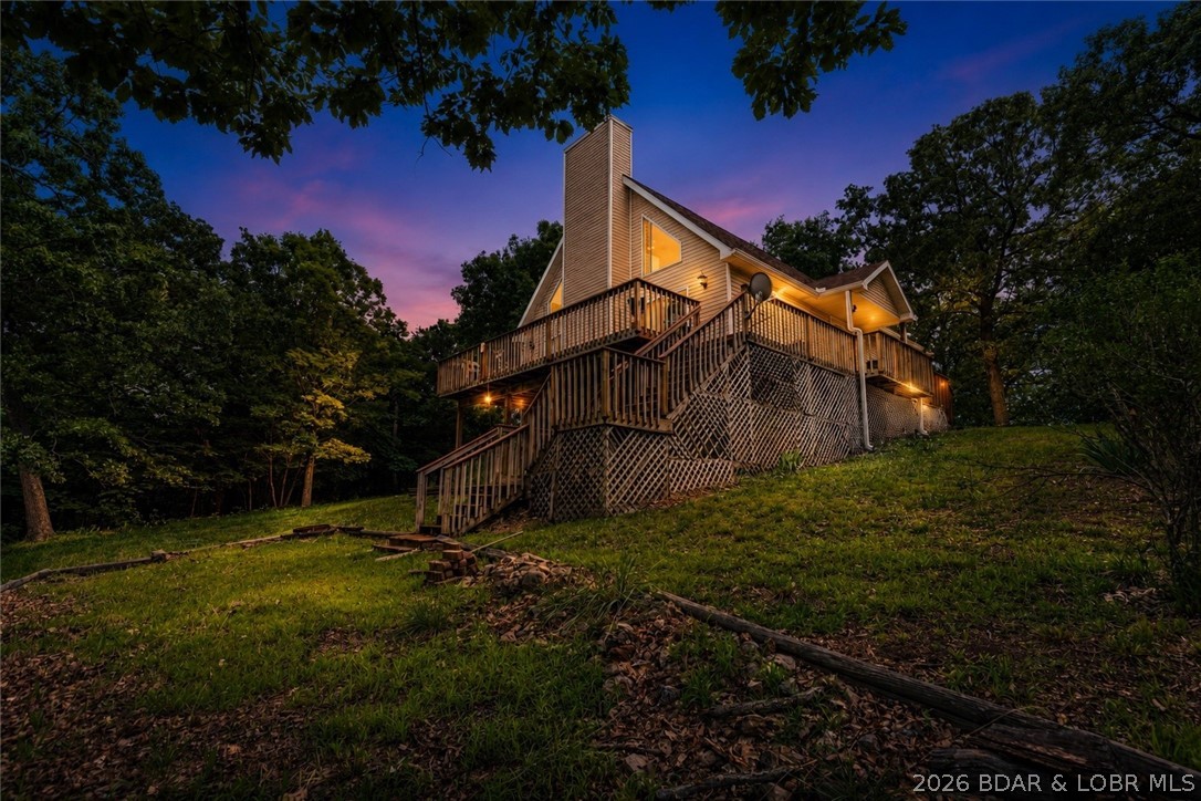 This 3 bedroom, 3 bathroom home sits on approximately 3.8 acres and offers the potential for stunning year-round lake views with selective tree removal. Located directly across the street from the community boat ramp, this property is a great fit for buyers who want convenient access to the water and room to enjoy the lake lifestyle. There is plenty of space for boats, trailers, PWCs, and other watercraft, giving you the flexibility that is often hard to find. Whether you are looking for a full-time home, weekend retreat, or investment opportunity, this property offers a rare combination of acreage, usable ground, lake access, and view potential. Pre-inspection and one year home warranty provided for peace of mind!