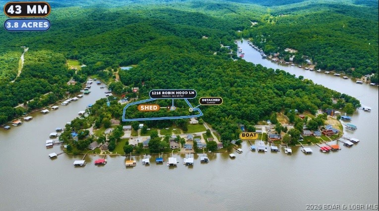 This 3 bedroom, 3 bathroom home sits on approximately 3.8 acres and offers the potential for stunning year-round lake views with selective tree removal. Located directly across the street from the community boat ramp, this property is a great fit for buyers who want convenient access to the water and room to enjoy the lake lifestyle. There is plenty of space for boats, trailers, PWCs, and other watercraft, giving you the flexibility that is often hard to find. Whether you are looking for a full-time home, weekend retreat, or investment opportunity, this property offers a rare combination of acreage, usable ground, lake access, and view potential. Pre-inspection and one year home warranty provided for peace of mind!