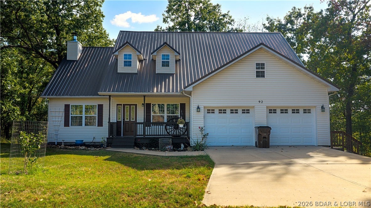 REFINISHED & MOVE-IN READY FOR YOU. There’s an easy, welcoming feel to this 4 Bedroom/3 Bath home in Camelot Estates. Step inside to a bright, open main level where vaulted ceilings draw your eye upward while the living, dining and kitchen areas flow comfortably together. This home offers 2'x6' construction, a new heat pump, new water heater, new flooring in bedrooms, freshly painted, renovated kitchen, new appliance and more. A wood-burning fireplace adds warmth to the living room, while the covered deck carries the living space outdoors. The main-level primary suite features a walk-in closet, private bath and its own deck space, with two additional bedrooms and another full bath nearby. Upstairs, a private fourth bedroom with its own bath is a great fit for guests, a home office or someone looking for added privacy. Set across two lots totaling approximately .86 acre, the property also offers a concrete driveway, extra parking and an attached two-car garage with a built-in workbench. Camelot Estates amenities include two pools, two clubhouses, tennis courts, a workout room, sauna, campground, fishing house and dock, and boat ramps.