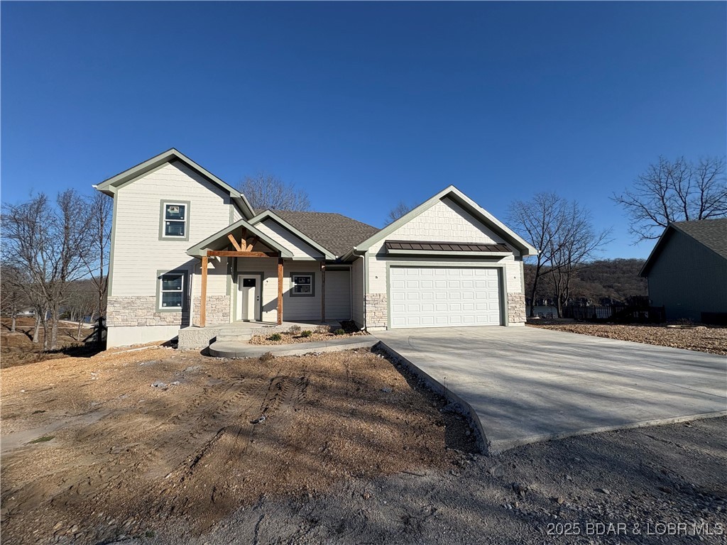 OPEN HOUSE SATURDAY AND SUNDAY JUNE 27-28 1-4PM Great Views of the water and Boat slip! Gorgeous brand-new custom-built home offering 3 bedrooms and 2.5 baths with stunning views of the lake. This open and airy floor plan is filled with natural light and designed for comfortable living. Enjoy mornings and evenings on the covered deck overlooking the water, or take advantage of the included boat slip for easy access to lake life. Features a two-car garage and beautiful finishes throughout. A perfect blend of luxury and relaxation—you won’t be disappointed!