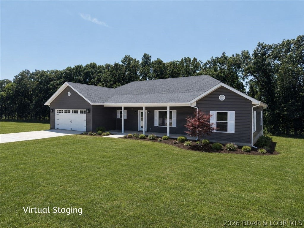 Over 3 Acres of peaceful country living in this brand-new, one-level home offering ~1820 square feet on 3.39 level acres near Eldon—just ~2 miles from Highway 54. Handicap accessible with zero-step front door. The thoughtfully designed split-bedroom floor plan features 3 bedrooms, 2 full bathrooms and an attached 2-car garage. High ceilings create an open, spacious feel throughout the home. The kitchen features white cabinetry and beautiful countertops, while the primary suite offers 2 walk-in closets and a tiled bathroom with a glass-door walk-in shower. Luxury vinyl plank flooring runs throughout the home with zero carpet, complemented by tiled bathrooms and tiled laundry room featuring cabinets, countertop, and utility sink. Built on a ground insulated slab with 2x6 exterior walls, the home also includes a concrete driveway and sidewalk, covered front porch and covered rear patio overlooking the level lawn. This beautiful new construction delivers space, comfort and low-maintenance country living. Insulated well house with separate power meter for shared well. Text or call me today for more information or showing.