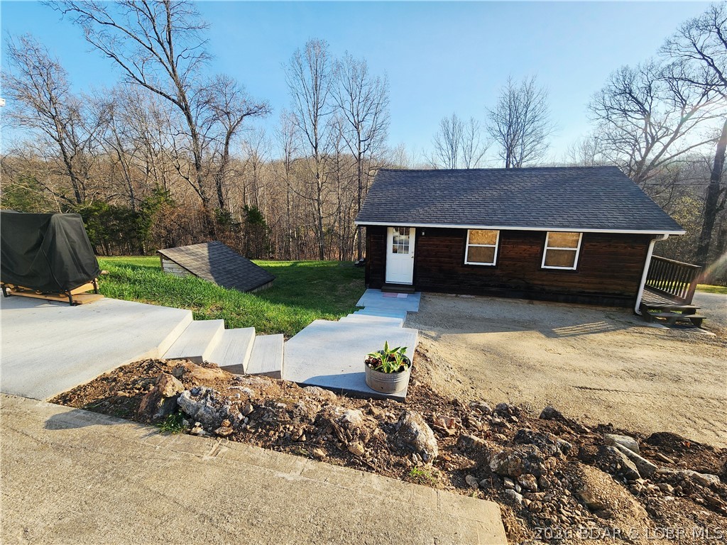 This 154.5 +- acre property in Miller County, Missouri presents an opportunity for recreational use, hunting, and private retreat potential. Located approximately 10 minutes from Eldon and about 20 minutes from the Lake of the Ozarks area, the property offers a combination of seclusion and accessibility to nearby towns, services, and recreational amenities.
The land is primarily timbered and is characterized by long, winding ridge systems that extend throughout the property. These ridges, along with the surrounding hills and hollers, create varied terrain and elevation changes that contribute to the overall layout of the tract. The natural topography may influence wildlife movement and provides a range of opportunities for outdoor activities such as hunting, hiking, and exploring. Established trails are present throughout much of the property, allowing for access by ATV or utility vehicle and supporting both recreational use and land management.
In addition to this outstanding tract of land, the cabin comes furnished with everything that is currently in it, and a 30 x 40 shop also await the new buyers.
