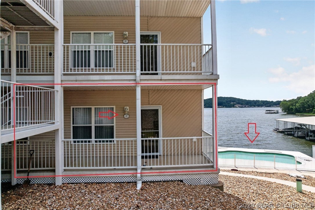 Lake front life never looked so good!  Check out this 3 bedroom 2 full bath home located at the 4 mile marker of the Big Niangua.  Minutes from Camdenton and close to The Cave, NautiFish, Fish and Company, Larry's on the Lake, and Ha Ha Tonka.  You will love this one level condo, just down one floor from parking and an end unit.  Close to the pool for easy access, a few steps from the dock with a 12x32 protected slip, and a pet area.  What more could you ask for?  Call for your private showing today!