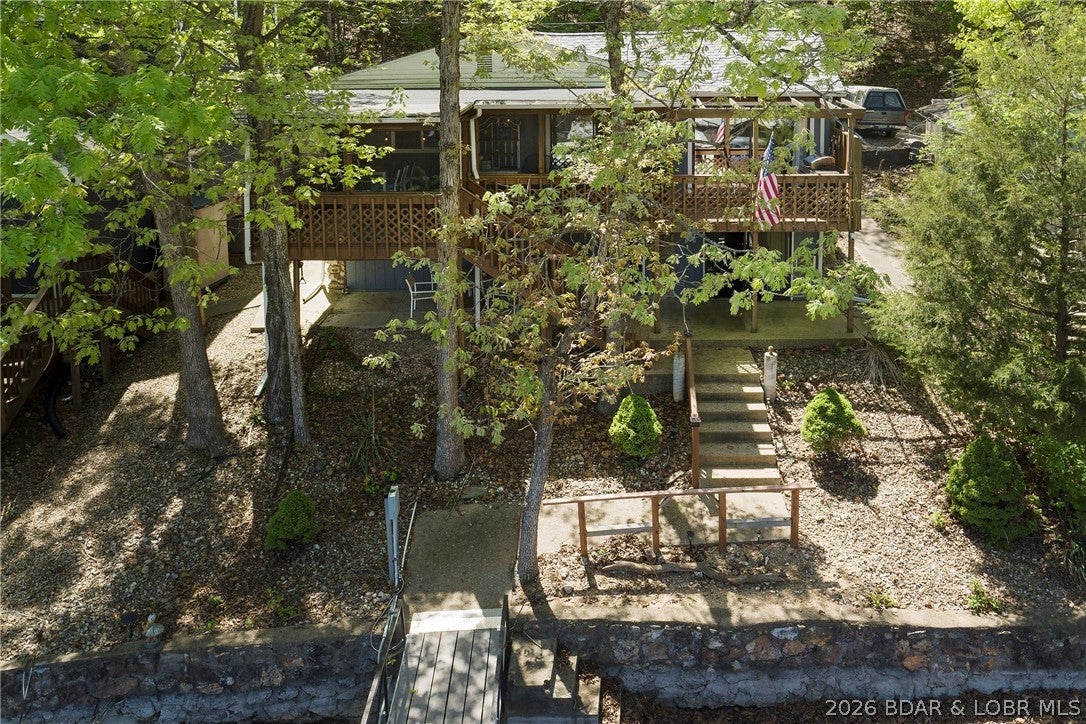 MOTIVATED SELLERS!! 2023 new HVAC with heat pump, ER heat, roof and gutters with leaf guards, washer, dryer and dishwasher. 2025, new water heater, and stove. All toilets replaced.  Currently used as a vacation rental. Living on entry level (including washer and dryer). Screened deck is perfect for morning coffee or evening entertaining. Deep water cove, WITH LESS THAN 12 steps to the Dock!!! Dock has a cruiser slip and large storage shed for your toys. Close to Paradise restaurant by land or water, 5 minutes to the grocery store.