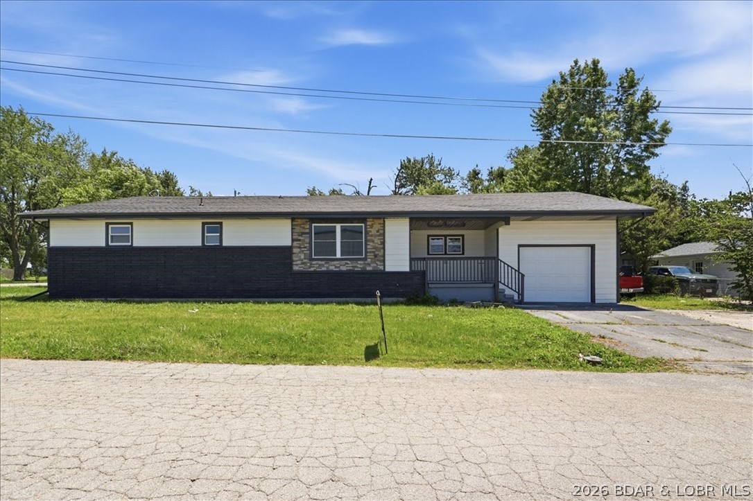 Welcome home to this beautifully remodeled 4-bedroom, 2-bath property located in the heart of Eldon. Situated on a spacious 1/3-acre fenced corner lot, this move-in-ready home has been thoughtfully updated inside and out! Step inside to discover updated finishes throughout, including refreshed flooring, fixtures, and contemporary touches that create a warm and inviting atmosphere. Multiple living spaces provide flexibility for entertaining, relaxing, working from home, or accommodating a growing family. The well-designed layout offers comfortable bedrooms, updated bathrooms, and plenty of room to spread out. Outside, you'll appreciate the fully fenced yard, perfect for pets, play, gardening, or outdoor gatherings. The one-car garage provides additional storage and convenience, while the corner lot offers added privacy and curb appeal. Call today to see if for yourself!