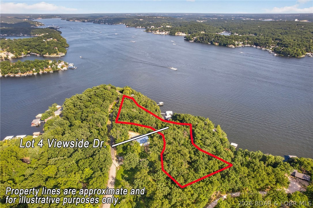 Rare opportunity to own approximately 2 acres with breathtaking panoramic views of the Lake of the Ozarks at the 5.5 Mile Marker on the North Shore. Whether you're dreaming of a luxury estate, family compound, or investment opportunity, this property offers incredible potential with the ability to subdivide. The elevated building site captures spectacular main channel views while providing privacy and room to create your ideal lake retreat. Even better, the waterfront lot directly below is also available for purchase, offering the opportunity to add a private dock or develop a community dock for multiple homes. With less than 2/10 of a mile of gravel road, you'll enjoy easy year-round access in one of the lake's most desirable locations. Build now, develop later, or secure this exceptional property while the opportunity exists. Endless possibilities and unforgettable views await! Lakefront lot is also for sale (MLS#3588457)