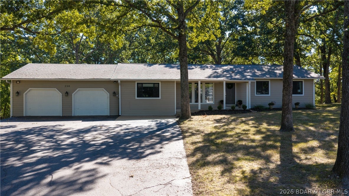 Welcome Prairie Lane where this inviting 3-bedroom, 2-bath home offering 1,735 square feet of comfortable living in the peaceful Whispering Hills subdivision is waiting for you. Sitting on a generous and level .55-acre lot, you’ll enjoy the quiet feel of country living while being just 10 minutes from schools, shopping, restaurants, and several of the attractions that the Lake Area offers.  Completely remodeled in 2022-23, this one-level ranch style home has a contemporary look throughout.  Outside, the spacious deck is ready for morning coffee, weekend cookouts, or relaxing at the end of the day. When the sun goes down, gather around the backyard firepit and enjoy the peaceful surroundings. An oversized 2-car garage provides plenty of extra room for vehicles, lake toys, tools, or storage and there's even an area where you can work on various projects if you choose.  
Space to spread out, room to entertain, and a quiet neighborhood setting—all while keeping everyday conveniences just minutes away. Come see what makes this Whispering Hills property such a great place to call home!