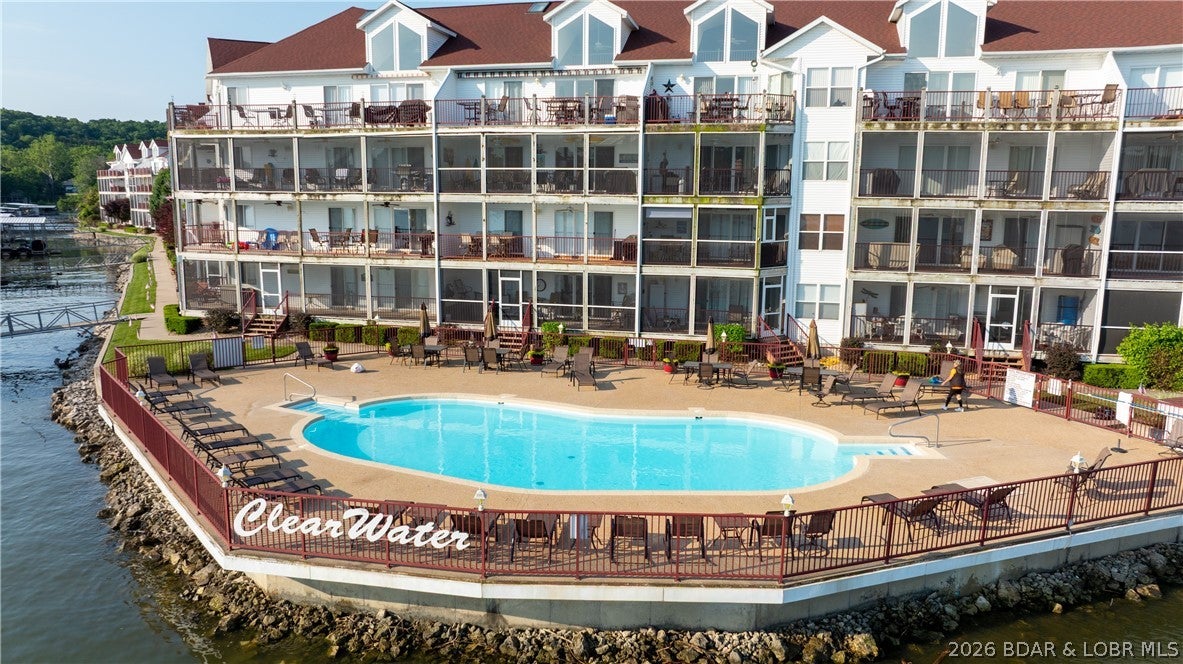 Welcome to Clearwater Condominiums, where quiet water, beautiful lake views, and a great location on the Big Niangua come together! This clean and well-maintained 2 bedroom, 2 bathroom condo is fully turnkey and ready to enjoy from day one. Step inside to a bright, inviting interior with beautiful finishes and a comfortable layout that flows out to the screened-in deck overlooking the water. Enjoy your morning coffee or unwind after a day on the Lake while taking in the incredible views. Recent upgrades include new Kohler toilets, new ceiling fans, and a BRAND NEW HVAC system installed in August 2026. All current special assessments have been PAID, including the new deck screen and soffits, giving the next owner even more peace of mind. Located just a few steps up from the parking lot, access is quick and convenient. The condo also includes a boat slip with lift and comes fully furnished, making it an excellent weekend getaway, full-time lake retreat, or rental opportunity. Clearwater offers two community pools, including one heated pool, a pavilion, playground, dog area, and more. Turn the key, drop the boat in, and start enjoying the Lake!