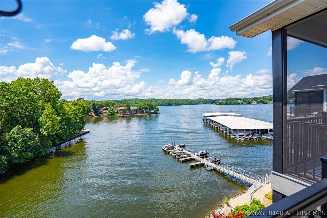 Welcome to easy lake living at Keystone Condominiums! This well-maintained 3-bedroom, 3-bath condo offers beautiful lake views, a spacious open floor plan, and abundant natural light throughout. The kitchen opens seamlessly to the living and dining areas, making it ideal for entertaining or relaxing after a day on the water, while the private deck provides the perfect place to enjoy your morning coffee or unwind in the evening. The primary suite offers a private retreat, and two additional bedrooms provide plenty of space for family and guests.Enjoy the convenience of a 14x36 boat slip just steps away, a community pool, and a location in the heart of Osage Beach that puts shopping, dining, golf, and entertainment just minutes away. Keystone has also completed major exterior improvements, including new composite decks and new roofs, providing added value and peace of mind for the next owner.Whether you're searching for a full-time residence or a weekend getaway, this condo offers the perfect combination of comfort, convenience, and low-maintenance lake living.