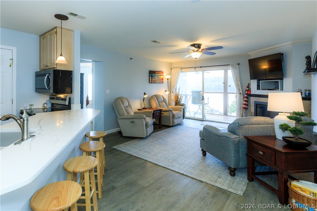 LAKE DAYS JUST GOT EVEN EASIER! Brand-new steps have been added from the back deck, giving you quick, convenient access to your private 10x24 boat slip—be on the water in minutes! Located in the highly sought-after State Park area, this first-floor 3-bed, 2-bath condo offers the perfect blend of comfort, convenience, & lake living. Inside, you'll find durable LVP flooring, stainless steel appliances, a spacious screened-in porch, & tasteful furnishings throughout. Best of all, it's being sold fully furnished, making it completely turn-key for your own getaway or your next investment property. Walk right out your back door to spend the day on the water, then unwind on the deck while taking in breathtaking State Park views & unforgettable sunsets that will remain protected for years to come. Need more room? A 12x30 boat slip and a rare two-car garage are available for an additional cost. The amenities here feature a community pool, clubhouse, fitness center, walking trails, playground, golf cart-friendly roads, expansive trailer parking, on-site property management and maintenance, and short-term rentals are allowed. This property delivers the lake lifestyle you've been dreaming of.