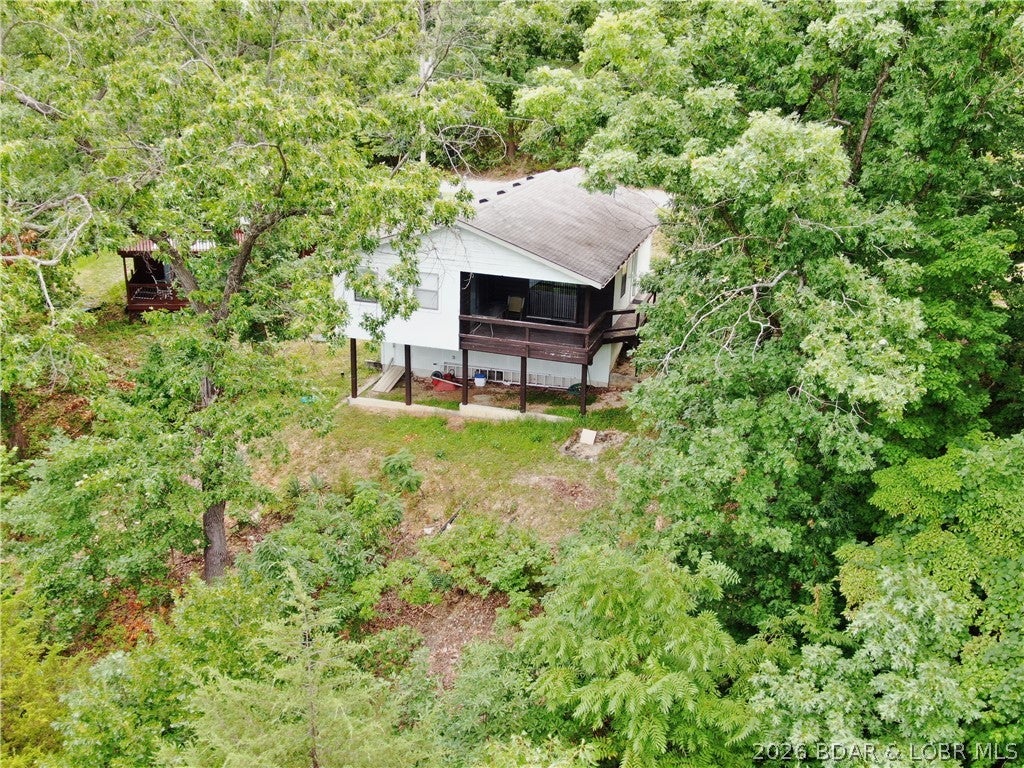 Motivated sellers are offering an incredible opportunity to own an affordable Lake of the Ozarks getaway with lake access and an included 10x24 boat slip! Whether you're searching for a weekend retreat, an investment property, or a place to enjoy year-round, this home is ready to help you make the most of lake living.

This inviting 2-bedroom, 1-bath home offers easy access to the water, so your next day on the lake is only moments away. Launch into endless days of boating, fishing, tubing, and sunset cruises, then come home to relax in a peaceful setting.

Furnishings are included, making this home nearly move-in ready and allowing you to start enjoying the lake from day one. An additional storage area provides plenty of room for life jackets, fishing gear, and other lake essentials.

Affordable opportunities like this don't come around often. With motivated sellers, lake access, an included 10x24 boat slip, and furnishings that make moving in a breeze, this property is ready for its next owners to start making unforgettable Lake of the Ozarks memories.
