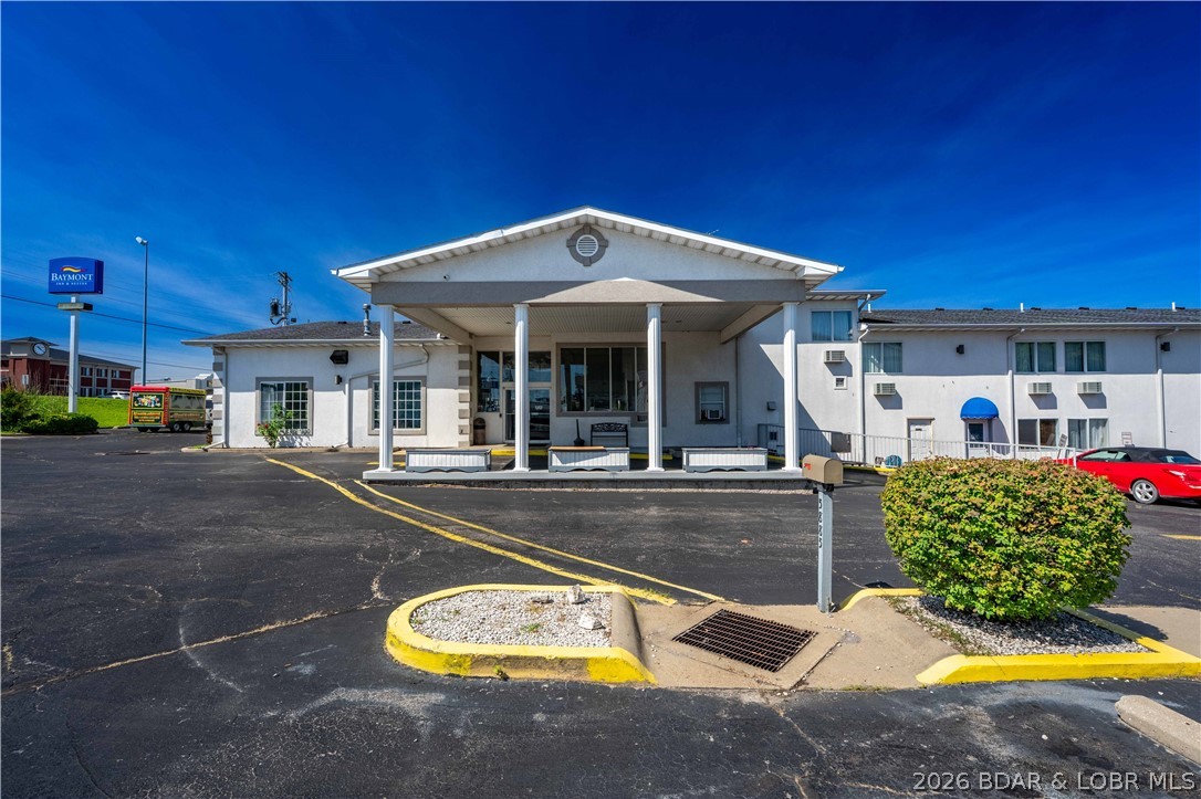 Outstanding hospitality investment opportunity in the heart of Lake of the Ozarks. The Baymont Inn in Osage Beach offers a rare chance to acquire a well-positioned, income-producing hotel w/ 70 rooms & a desirable location adjacent to Lake Regional Hospital & Blair's Landing, one of the area's best retail & entertainment centers. This strategic location provides consistent demand from business visitors, contractors, & the region's robust tourism market. The property offers an amenity package designed to support strong guest satisfaction & repeat business, including indoor/outdoor swimming pools, a dry sauna & ample parking. Operational efficiency is enhanced through a fully owned security system & owned solar panels, helping reduce costs & improve long-term profitability. W/ multiple demand drivers, excellent visibility, & a proven hospitality footprint in one of Missouri's most visited destinations, this asset presents significant upside through revenue optimization, occupancy growth, & continued market expansion. The combination of location, infrastructure, & guest amenities creates a compelling turnkey investment for investors seeking stable cash flow w/ future growth potential.
