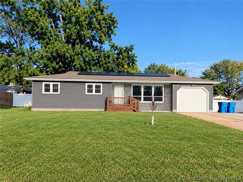 ONE LEVEL LIVING in a most desirable, pretty ELDON neighborhood, and WHAT A GLOW UP!  From the exterior look (new vinyl siding, garage door, exterior doors, and privacy fence) to the interior- freshly painted, black appliances , gas range, to the bones of the home-New HVAC in 2025(12 yr warranty), solar panels(who doesn't want a lower utility bill) windows, doors, flooring, drywall, insulation, reverse osmosis water treatment system , tankless water heater, and water softener. MOVE IN ready, conveniently located to hwy 54 (10 min from the lake) and all that Eldon has to offer! What a lovely, cozy and enjoyable home.