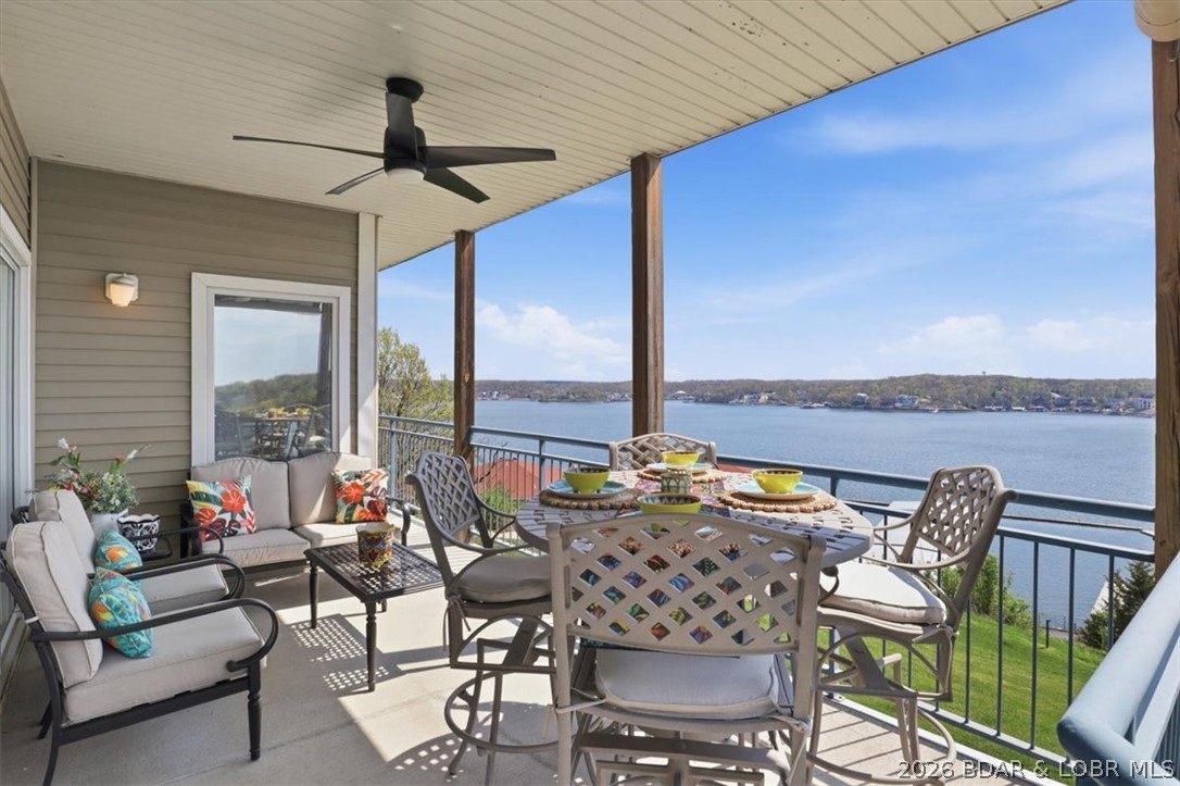 Some homes invite you in. This one invites you to slow down. Wake up to unobstructed main channel views at the 14 MM of the Osage and end each day with unforgettable sunsets. This 3-bedroom, 2-bath Palisades condo offers 1,329 sq. ft. designed for gathering, relaxing, and making memories at the lake. The open-concept kitchen, dining, and living areas flow together effortlessly, with 9-foot ceilings, abundant natural light from the end-unit location, and a cozy fireplace that makes every season feel inviting. A newer HVAC system offers year-round comfort, and the partially furnished interior makes settling in easy. Spend your days on the water with your 12x32 boat slip, then unwind on the spacious deck as boats drift by and the sun slips below the horizon. Enjoy the gated community's three outdoor pools, clubhouse, beautifully maintained grounds, and convenient location just minutes from dining, golf, shopping, and lake favorites. It's the kind of place where weekends turn into traditions and every season brings a new reason to gather. Schedule your private showing today.