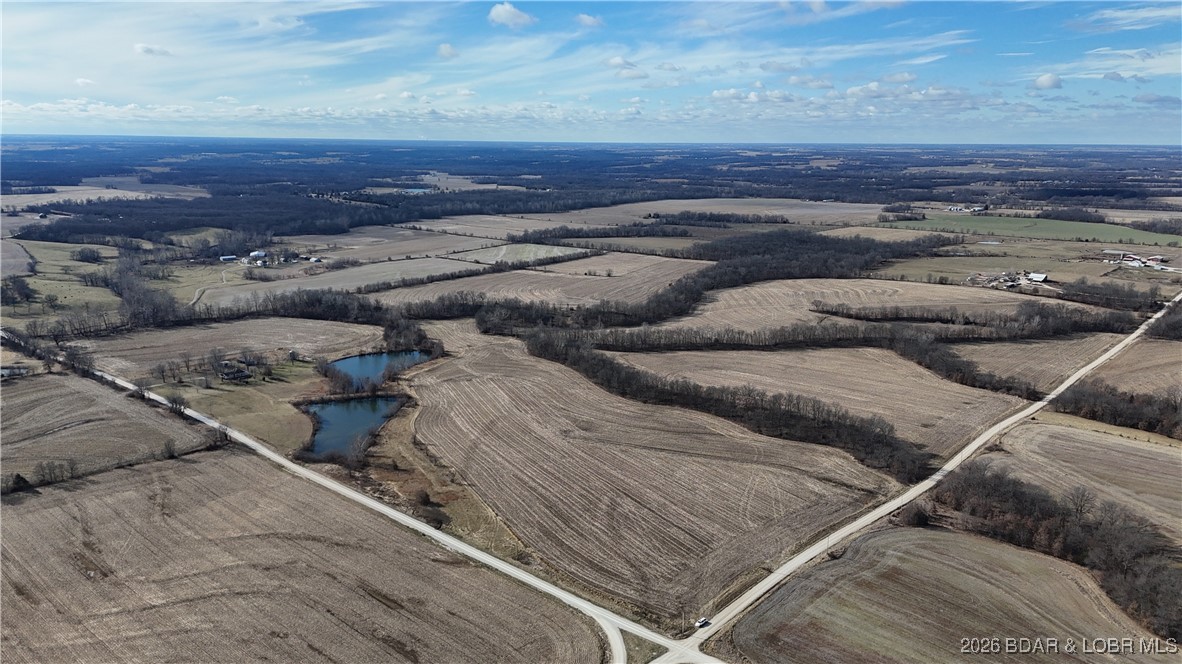 Discover the possibilities with this exceptional 177± acre property located just minutes from Bowling Green, MO. Situated at Pike 405 and 409 in the heart of true Amish Country, this tract offers a rare blend of productive farmland, natural beauty, and development potential. Approximately 144 acres are tillable/open ground, ideal for farming corn, wheat, or soybeans, while remaining acres feature wooded areas and a scenic pond that add character and appeal. With rural water and electric already located at the property, the groundwork is in place for a variety of uses. Whether you’re an investor or developer envisioning a community of homes on small-acre tracts offering peaceful country living close to town, or a buyer looking to farm, build your dream home, or hold land as a long-term investment, this property delivers. Convenient location, versatile land, and endless opportunities make this acreage a standout offering. Call today to schedule your private tour and explore all this property has to offer.