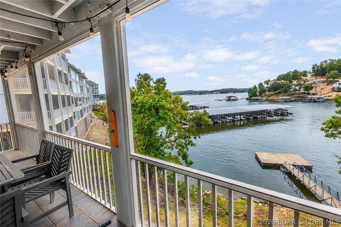Welcome to your lake getaway! This beautifully furnished, turn-key 2-bedroom, 2-bath condo offers stunning lake views and effortless living. Enjoy morning coffee or evening sunsets from the private balcony overlooking the water. Inside, you'll find an open-concept layout with a bright, updated kitchen, spacious living area, and comfortable bedrooms-perfect for relaxing or entertaining. Enjoy generous storage space perfect for staying organized and clutter-free. Located in a desirable complex with easy access to the lake, community amenities, and nearby restaurants and shopping, this condo is ideal for a weekend retreat, investment property, or full-time residence. Included are a 12 x 30 boat slip with an 8,000 lb. lift and a PWC slip. Just bring your suitcase-everything else is ready for you!