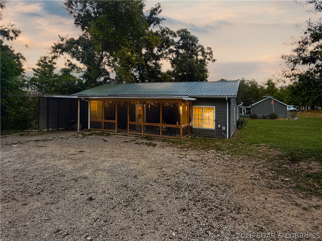 401 Valley Spring Rd in Camdenton, MO offers the opportunity to enjoy peaceful country living while staying just minutes from Lake of the Ozarks recreation, Camdenton amenities, and Hwy 54 access. Situated on approximately 2.25 acres, this 3-bedroom, 2-bath home features 1,446 sq ft of comfortable one-level living with an open layout designed for everyday functionality. The acreage offers room to add a future garage, workshop, garden, or additional outdoor entertaining space. With rental potential allowed and a convenient location near the Lake area, this property offers flexibility for full-time living, a weekend retreat, or investment opportunity.