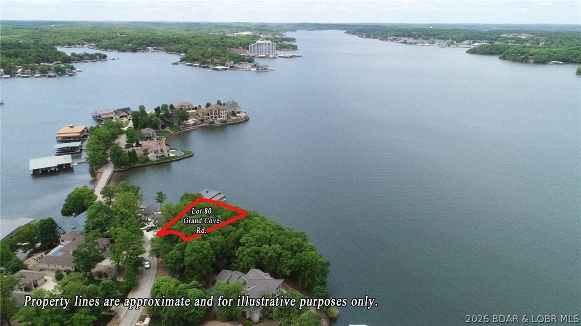 Discover an exceptional opportunity to build your dream waterfront estate in the prestigious Porto Cima community at Lake of the Ozarks. Offering 119 feet of gentle lakefront, this beautiful homesite provides an ideal setting for a custom residence with an easy walk to the water and picturesque lake views. Located in one of the Lake's most sought after luxury communities, you'll enjoy the renowned Jack Nicklaus Signature Golf Course, upscale amenities, and an unmatched lifestyle.  What truly sets this property apart is the rare opportunity to purchase the adjoining lakefront lot (MLS #3587649), creating an incredible combined 271 feet of prime shoreline. Whether you're seeking added privacy, room for an expansive estate, or the flexibility to create a one of a kind waterfront retreat, opportunities like this are exceptionally rare. Secure one exceptional homesite or combine both to create one of Porto Cima's most impressive lakefront properties.