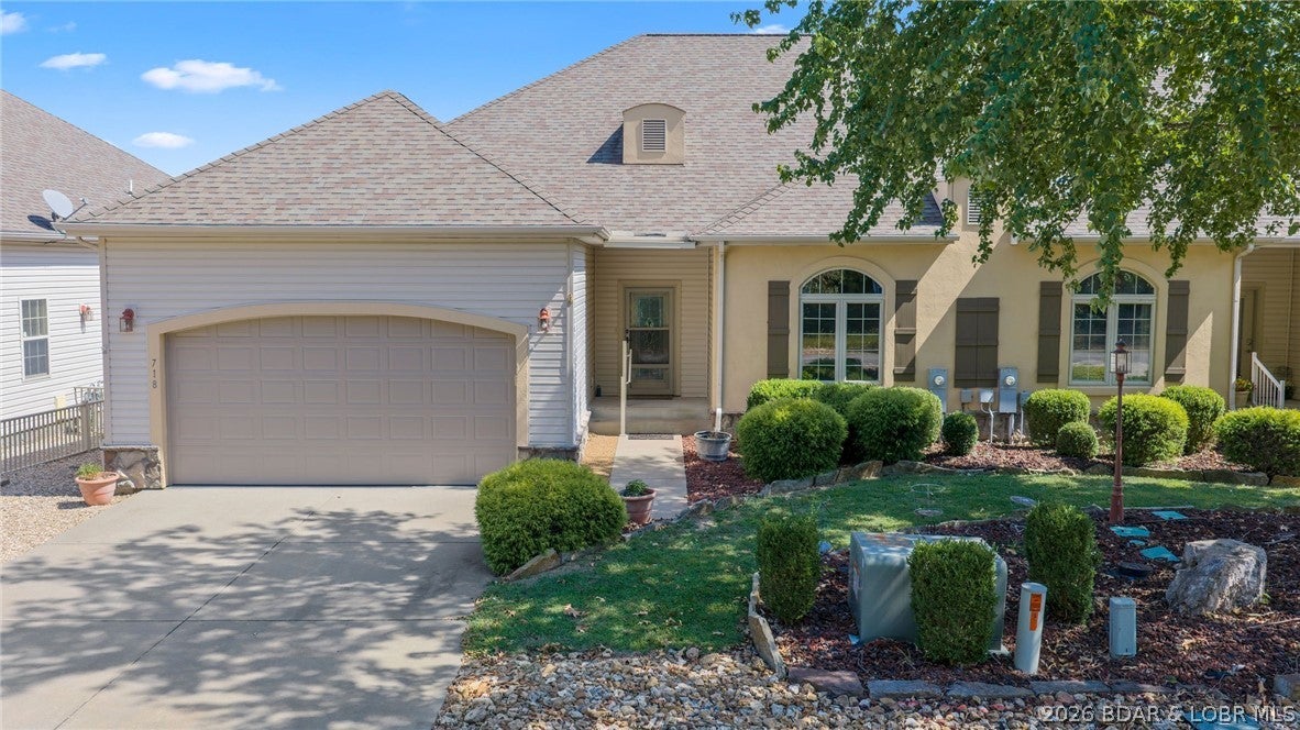 Step into this elegant 4-bedroom, 3.5-bath villa that delivers refined architectural detail, and extra amenities including a 12×30 boat slip. Arched entries define the open-concept living space, where natural light & the gas fireplace anchors the great room in warmth. The flow from living to dining to kitchen is seamless. The open kitchen is built for gathering with a breakfast bar & keeping the conversation flowing. The primary ensuite bathroom features double sinks, a walk-in shower, a jetted tub for evening unwinding & a walk-in closet. Three additional bedrooms and 2 1/2 more baths ensure everyone has their own comfortable corner of the home. Tucked away is a massive storage room useful for gear, or seasonal décor. Start your mornings on the screened deck with coffee in hand, or al fresco dining without the bugs. When the seasons shift, the three-season sunroom keeps the outdoors within reach.This villa comes with a deeded 12×30 boat slip at the community dock. The community itself offers 2 pools, clubhouse, marina, horse stables, fishing & tennis courts. Make this villa your home with lake life, lake views, & lake access. Schedule today!