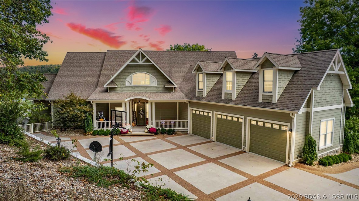 Experience the perfect blend of privacy, luxury, and convenience in this exceptional home on a 1.7-acre estate-sized lot overlooking the 27-hole Arnold Palmer-designed golf course, scenic bluffs, and the river. Beautifully updated and move-in ready, this spacious home offers 5 bedrooms plus an 800+ sq. ft. bonus room, providing plenty of space for family, guests, or entertaining. Step outside to your private pool and enjoy summer days in a peaceful setting. Residents also enjoy access to a clubhouse, fitness center, and community pool. Located in one of the area's most desirable neighborhoods, it's perfect for evening walks, bike rides, and an active lifestyle. Just minutes from Highway 54, top-rated schools, shopping, dining, and nearby marina facilities offering convenient lake access, fuel, and secure boat storage. This is a rare opportunity to enjoy the best of Lake of the Ozarks living with space, privacy, luxury, and everyday convenience.