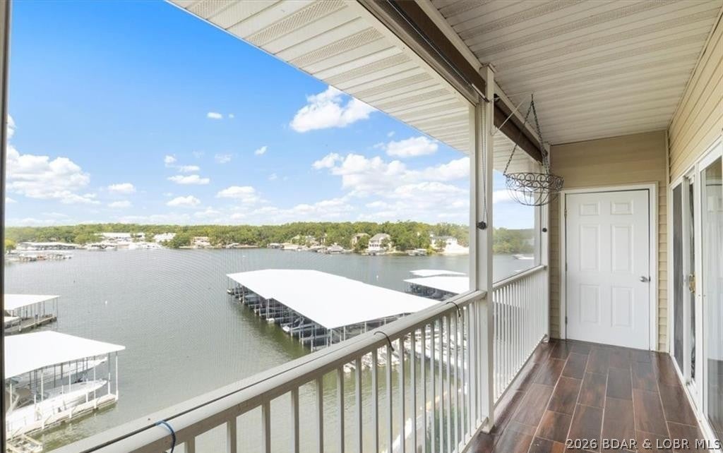 Beautifully updated 3-bedroom, 2-bath condominium in the heart of Osage Beach! This spacious unit features luxury vinyl plank flooring, quartz countertops, and a cozy gas fireplace-perfect for year-round enjoyment. The primary suite offers a private en-suite bath, creating a comfortable retreat after a day on the water. Included is a generous 16x40 boat slip plus a PWC slip, making this an exceptional package for lake lovers. Enjoy the convenience of elevator access and a prime location within walking distance to Dog Days and the new Oasis Amusement Park. Just minutes from local nightlife, waterfront restaurants, and shopping, this property offers the ultimate blend of comfort, convenience, and lake lifestyle. Whether you're looking for a full-time residence, vacation getaway or investment opportunity (nightly rentals allowed), this one checks all the boxes!