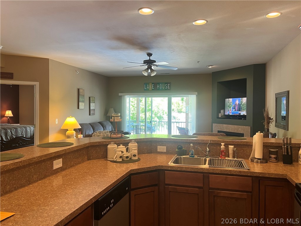 Beautiful well maintained lake condo. 3 bedroom and 2 baths located in a building with an elevator to take you to the dock and pool with no steps. This unit has a 10x24 ft slip with a hoist and 2 PWC spaces with hoist included. Cedar Heights is a gated community with 3 pools and lots of parking.