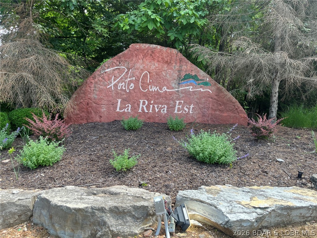 Ready for you to build your dream home overlooking the lakefront homes. Porto Cima offers access to swimming pools, tennis and pickleball courts, bocce ball & horseshoe pits, club house as well as access to the Jack Nicklaus Signature Golf Course. The Club at Porto Cima Club is located nearby across MM from lot. The HOA fee covers most Four Seasons amenities. There is a additional charge for owners who use the Four Seasons fitness club, boat storage, or campground. Membership at The Club at Porto Cima is additional. Boat slips are available at the Yacht Club. Nearby Community bridge is now toll free allowing quick access to both sides of the lake.