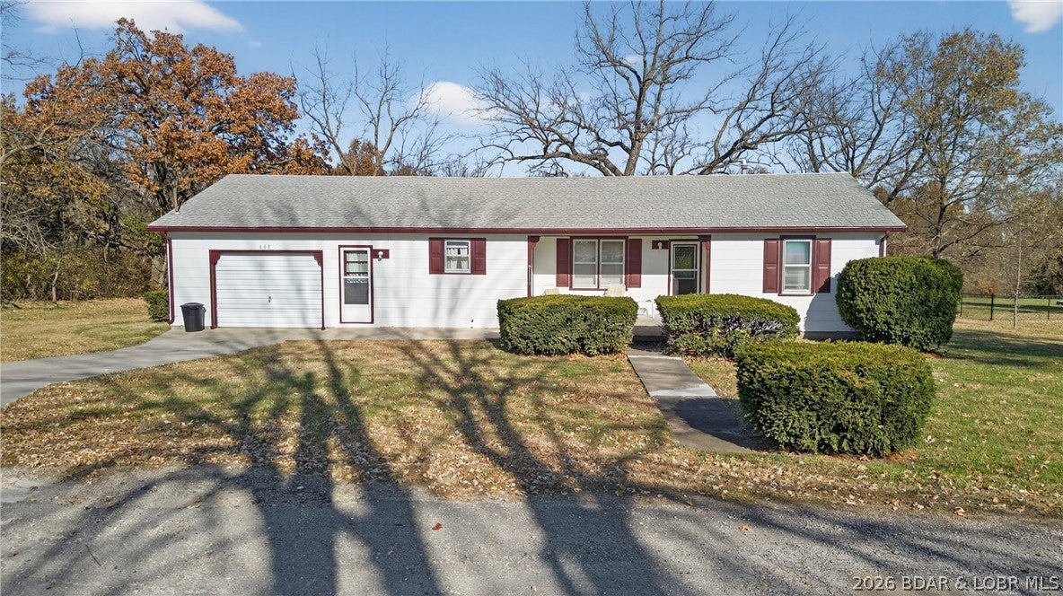 Sprawling 3-bedroom, 2.5-bath ranch home in Cole Camp with plenty of space and several recent updates! The home features a new roof installed in 2026, fresh interior paint, and new flooring, giving it a refreshed, move-in-ready feel. Inside, you'll find two oversized family rooms offering tons of space for entertaining, holiday gatherings, game nights, or simply spreading out. Step outside to a large backyard with plenty of room for outdoor activities, pets, or entertaining. An attached one-car garage provides additional parking and storage. Conveniently located just minutes from Cole Camp High School and Main Street, this home offers a great combination of space, updates, and location. Come take a look for yourself!