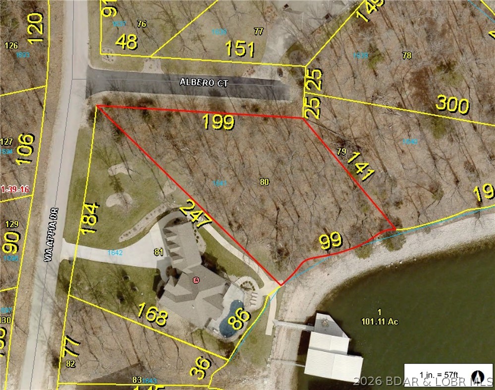 Imagine waking up to breathtaking main channel views on this large, treed lakefront lot in prestigious PortoCima. This gentle lot is the perfect canvas for your custom dream home: expansive building envelope for a trulylarge estate, south by south-eastern exposure ideal for a sun-drenched pool, protected cove for calm dockingand swimming, and private cul-de-sac access ready for a gentle driveway. No steep terrain challenges here.Picture it: soaring windows framing sparkling lake views, multiple levels of lakefront living, effortless circledrive welcoming guests, and endless sunrises and sunsets over the lake. In world-class Porto Cima, elevateyour lake lifestyle with optional golf, yacht club, and more. Your vision becomes reality here. Don't miss thisrare gem. Claim your piece of lake paradise today!