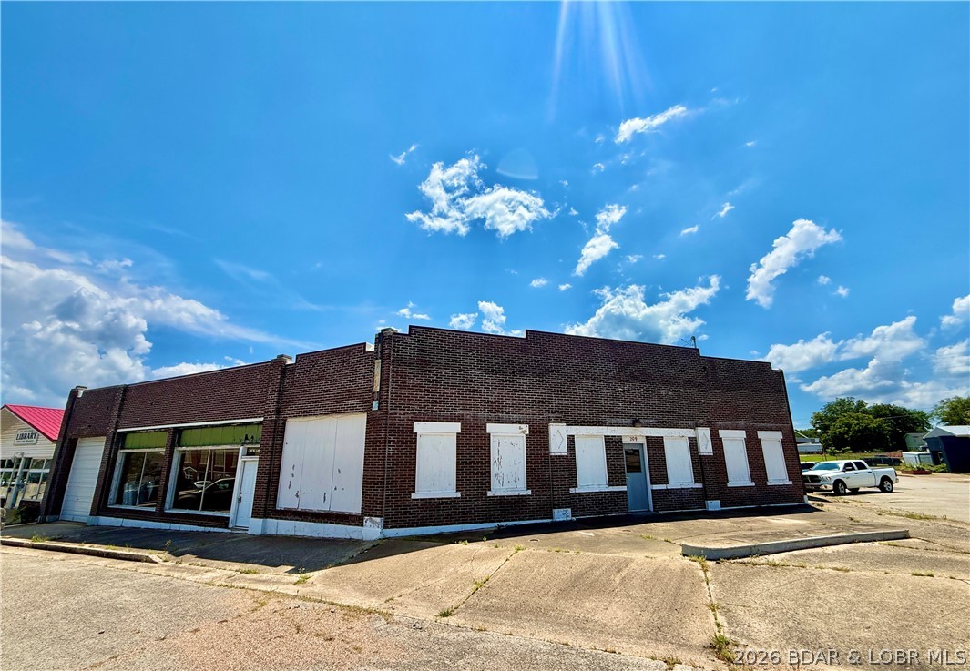Opportunity awaits with this impressive 13,000+ square foot commercial building located in the heart of Richland! Offering the potential to accommodate up to 6 separate businesses, this versatile property is ideal for investors or entrepreneurs looking to expand their portfolio. Even better, 3 units are already leased, providing immediate cash flow from day one. The remaining space offers endless possibilities… create a repair shop, boutique, specialty retail store, workshop, office space, showroom, fitness center, warehouse, or bring your own unique business vision to life. With its flexible layout, the opportunities are truly limitless. Centrally located between Lake of the Ozarks, Lebanon, and St. Robert/Fort Leonard Wood, this property is perfectly positioned to attract customers from surrounding communities and neighboring towns, making it an outstanding location for a wide variety of businesses. Whether you’re looking for a smart investment with existing income or the perfect place to establish your own business, this commercial property delivers exceptional potential in a highly desirable central location!