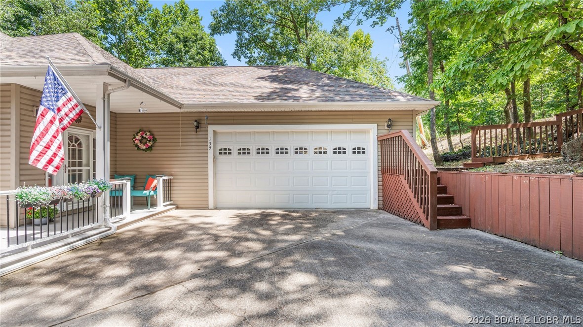 Beautiful 3BR/2BA home in desirable Camelot Estates! Offering 1,500+ sq ft on 3 lots totaling just over an acre, this property is tucked away on a quiet side street and located in the Camdenton School District. The home features an open-concept kitchen, dining, and living area with vaulted ceilings, large closets for extra storage, a large sunroom, an additional screened-in deck, 2 gas fireplaces, and an oversized 2-car garage with a sink, and additional storage space. Camelot Estates amenities include a community pool, tennis courts, clubhouse, fishing dock, lake access, and boat ramp. Boat slips may also be purchased or leased from other owners. A great opportunity to enjoy space, comfort, and lake-community living in one of the area’s most sought-after neighborhoods.