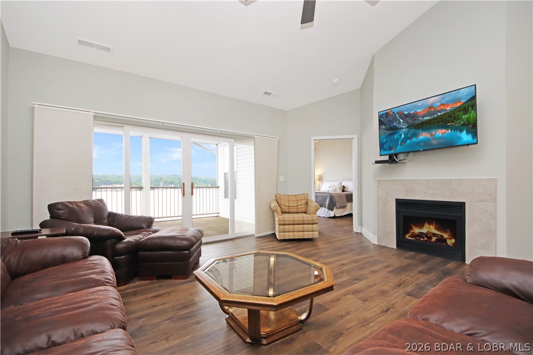 Discover lake living at its best in this top-floor 3 bedroom condo with incredible panoramic views of the lake. The open-concept layout is perfect for relaxing or entertaining, featuring a spacious kitchen, generous living area, and a private lakeside primary suite. Step out onto your balcony and take in the view. Located at the 4MM, this gated community offers resort-style amenities, including a pool and a 14x40 boat slip, so you're always ready for a day on the water. If you've been searching for the perfect lake getaway or investment opportunity, this one is worth seeing. Reach out today to schedule your private tour!
