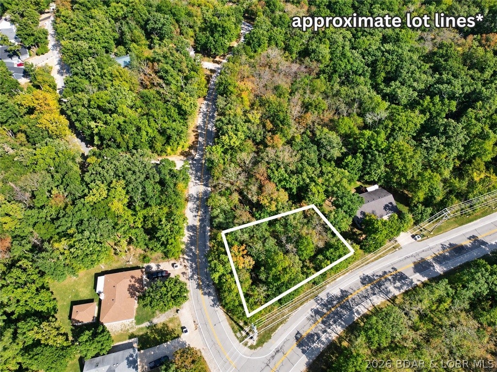 Build your next home in the heart of Four Seasons! This vacant lot offers a great opportunity to bring your vision to life in one of the Lake’s most established communities. Enjoy access to the many Four Seasons amenities, including community pools, boat ramps, playgrounds, tennis and pickleball courts, and more. Conveniently located near golf, dining, shopping, and all the fun Lake of the Ozarks has to offer. Whether you’re planning a full-time residence or a weekend retreat, this is your chance to own a piece of the Lake lifestyle!