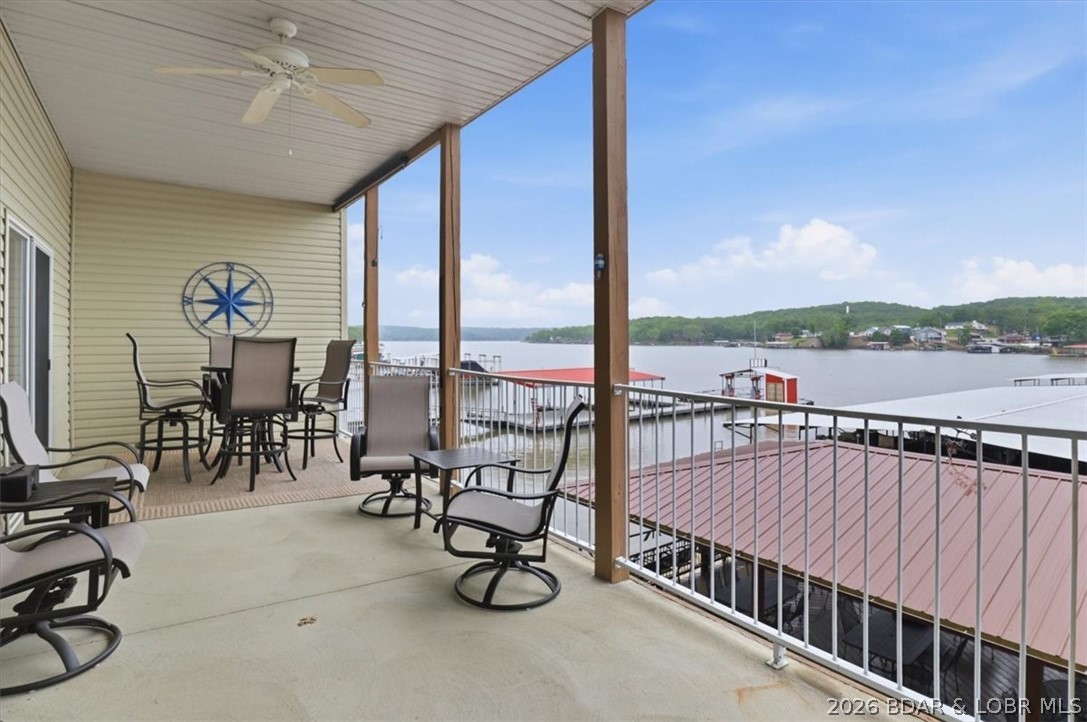 Cute, updated, and completely move-in ready—just bring your suitcase and start enjoying the lake! This furnished 3 bed, 2 bath condo at Mimosa Beach on the 44MM brings a fresh, beachy vibe that’s both stylish and comfortable. The open layout lives larger than expected, anchored by a spacious kitchen with a large peninsula offering tons of seating, a pantry, and gorgeous high end quartz. Updates include paint, flooring, countertops, fixtures, appliances and much more! It has been thoughtfully updated and decorated. Step out to the deck from both the living room or primary suite with plenty of space and outstanding views! Enjoy an easy walk to the dock, plus a 10x25 boat slip included! The community also offers a waterside gazebo with plenty of patio seating—an awesome spot to gather with others or just relax. Located right next to a gas dock and convenience store for quick fuel-ups, and just minutes by water to Big Dick’s, Boondockz, Bear Bottoms, and Red Fox. Well-maintained complex with no nightly rentals allowed—ideal for those wanting a more relaxed, residential lake experience.