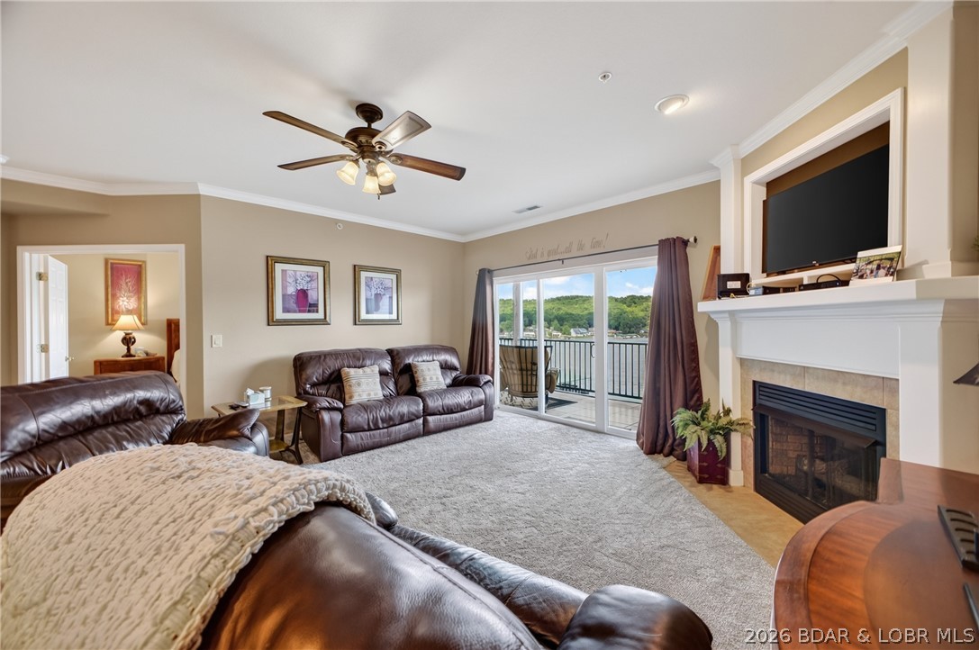 This beautiful condo offers unbeatable views of the Big Niangua at the 13 MM.  This spacious 3 bed 2 bath condo is TURN KEY, fully furnished.  For convenience there is an ELEVATOR nearby for easy access to the condo or to the dock.  Secure GATED access with generous parking for host & guests.  Great location by car or by boat to lake area restaurants, shopping, hiking, & outdoor adventures! Excellent for golfers as you are right next to Old Kinderhook & Lake Valley Golf Club.  Situated in a popular complex known for strong rental performance, this condo comes fully furnished & ready to generate income or serve as your personal haven. Lots of amenities with multiple pools to choose from. This condo offers the ultimate blend of comfort, convenience & location.  The lake is calling...make this yours today!