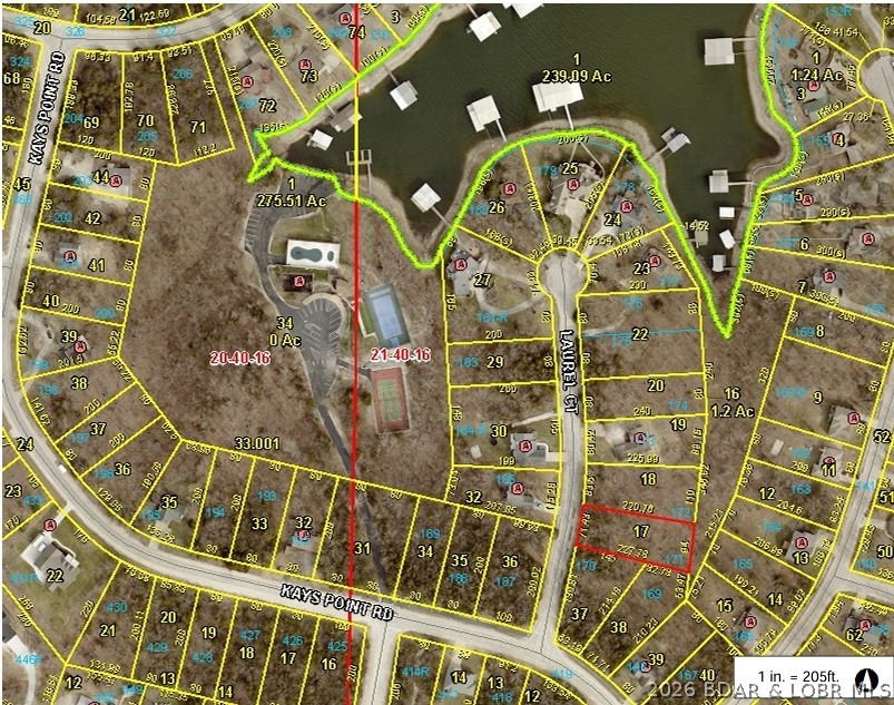 Build Your Dream Home in the Village of Four Seasons! Embrace the ultimate lake area lifestyle with this beautiful, wooded residential lot nestled in the highly sought-after Village of Four Seasons. Offering a perfect blend of privacy and natural beauty, this pristine parcel features mature trees and a gentle topography, making it the ideal canvas for your custom dream home or vacation getaway. Unmatched Community Amenities Include)  Pools & Recreation: Access to multiple community swimming pools, playgrounds, and clean interior lakes. Lake Access: Boat launch ramps and community docks just minutes away. Active Living: Tennis courts, pickleball courts, and fitness facilities. World-Class Golf: Proximity to premier championship golf courses, including The Cove and The Ridge. Peace of Mind: Enjoy 24/7 community security and well-maintained paved roads.Conveniently located just a short drive from Osage Beach dining, shopping, and entertainment, this lot offers the quiet sanctuary you want with the resort-style amenities you deserve. Don't wait to start living the lake life—secure your piece of Horseshoe Bend today!