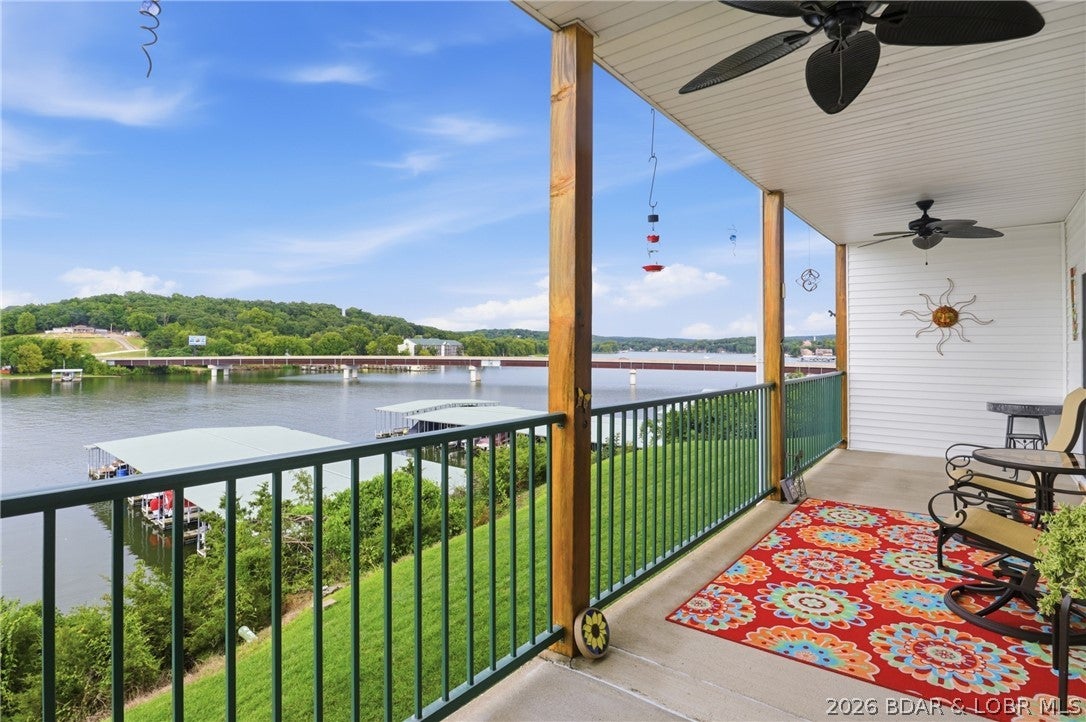 Welcome to your lakefront getaway at 440 Cedar Heights Dr., Unit 2F, Camdenton, Mo. This charming 3-bedroom 2-bath, walk-in waterfront condo is located in the sought after gated community Of Cedar Heights at the 13 MM of the Big Niangua. Featuring an open floor plan, custom cabinetry, a pantry, generous cabinet space and brand new carpet in the all the bedrooms. Start your mornings on the covered deck overlooking the water, or wake up to stunning lake views from both the primary suite and the living room. Take the convenient elevator down to the community dock where your 12x30 boat slip and hoist is located. Enjoy the three community pools with one nearby. Great views with a  peaceful setting and calm waters. Just minutes from Lake Valley Golf Club, Old Kinderhook Golf Resort, Ha Ha Tonka State Park, with shopping and dining nearby. Enjoy as your personal residence or use as a nightly rental. Two Garage Units Available and a boat available for extra money.