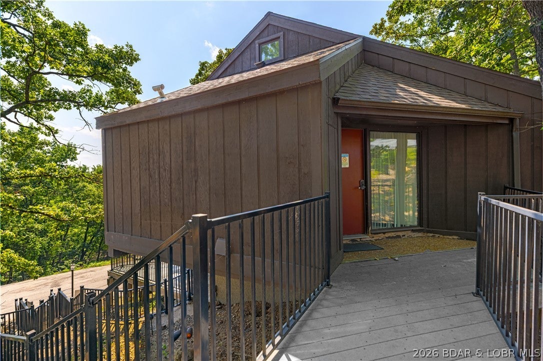 Welcome to Unit 52 at Tree Top Village, a distinctive three-story retreat offering 1,754 sq. ft., 3 bedrooms and 2.5 bathrooms. The multi-level design provides plenty of room to gather, relax and enjoy the Lake of the Ozarks lifestyle while still offering privacy for family and guests. With a proven rental history, this property is well suited as a personal getaway, full-time residence or income-producing vacation rental. Tree Top owners and guests enjoy two community pools, plus access to the outstanding Four Seasons amenities. Whether you are looking for a place to make lasting memories or an established rental opportunity, Unit 52 offers an appealing combination of space, flexibility, community amenities and investment potential in one of the Lake area’s most recognizable communities!