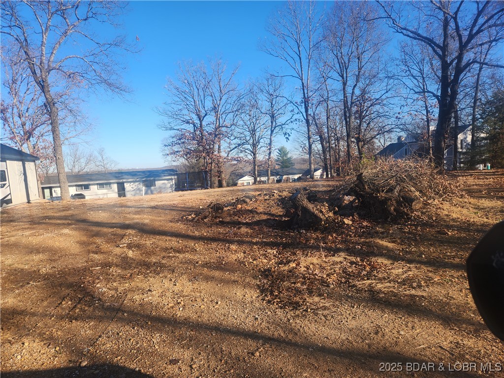 Persimmon is a street located off Oak Rd, maybe 5 minutes or a little more from the hospital. This is one of very few lots in Osage Beach that truly is flat. This is a very buildable lot with city utilities and ready to go. If you are looking for a lot that you can build a ranch style home on, you will want to take a look, you will not be disappointed. The lot is in a cul-de-sac. Lot 41 is the 2nd lot on the right side. Persimmon is a very small subdivision with only 6 lots, 2 are in the cul-de-sac.