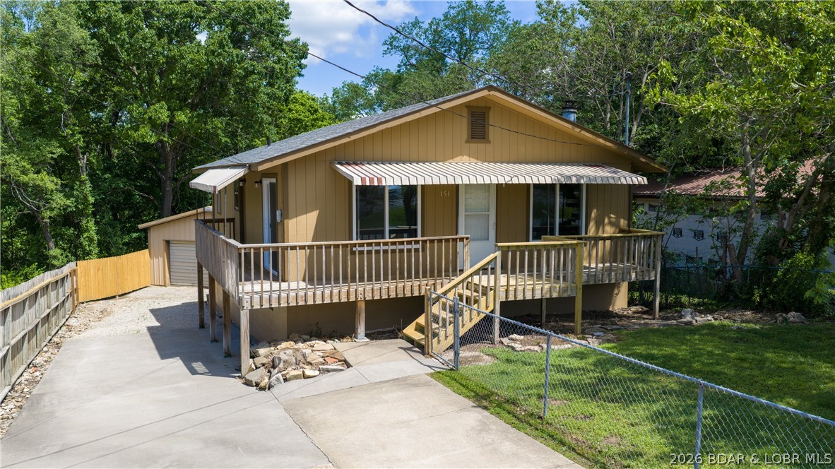 Completely remodeled and move-in ready, this in-town home offers the perfect blend of modern updates and everyday functionality. Featuring 4 bedrooms, 2 bathrooms, and 1,722 square feet of living space, the home has been thoughtfully updated throughout to provide a fresh, clean feel. An additional 386 square feet offers a blank canvas—ideal for a second living area, home office, gym, or whatever fits your needs. Enjoy the convenience of city water and sewer, plus a location within walking distance to Camdenton shopping, restaurants, and schools. Outside, a 24x24 detached shop provides excellent space for storage, hobbies, or a workshop setup. Whether you’re looking for extra room to grow or a turnkey property with flexibility, this home checks all the boxes.