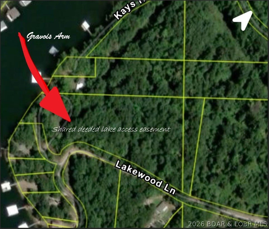 Own your very own peace of paradise with a shared recorded deeded lake access easement to Lake of the Ozarks which allows swimming, fishing, and kayaking. Gently sloping property offering added flexibility for build. No planning or zoning restrictions and no HOA fees. Pop up that camper and live off the grid! Protective covenants in place to help preserve value. Ideal for a shouse, personal storage building, or future home site. Discover your dream property just 15-20 minutes from Coffman Beach Public Boat Launch and the beautiful Lake of the Ozarks! Agent is the trustee for this property. Tax bill is from a larger tax bill, therefore tax bill is to be determined.