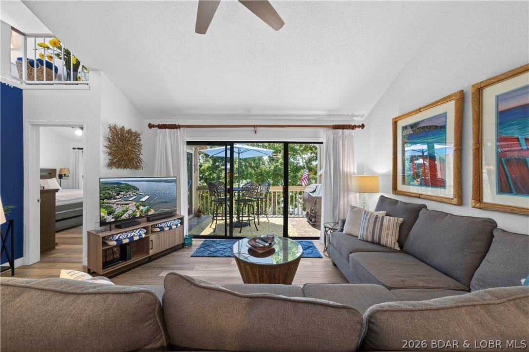 Welcome to this beautifully updated 3-bedroom, 2-bath top floor condo W/ Gorgeous lake views in Bay Point Village. This 1,125 sq ft, one-level condo W/ loft features vaulted ceilings, luxury vinyl plank flooring, and comes Turn Key. Inside you will find many recent upgrades including UV Blocking window tinting, new refrigerator, Bosch Dishwasher, New Granite Countertops & Backsplash. Dryer, Water Heater, HVAC unit, and exterior a new Roof. Enjoy peaceful cove protection with main channel views, ideal for boating and relaxing. The condo includes a 12x30 boat slip W/ a remote controlled 10,000 LB lift. Step outside to the open deck and take in the lake views, or enjoy the community amenities, including 2 pools, Large clubhouse with full kitchen, workout room, playground, Fire pit, Playground, and designated pet area. Bay Point Condominiums has it ALL!! Nightly rentals are allowed, and this unit has a strong rental history, making it an EXCELLENT investment opportunity or personal lake retreat. Conveniently located in Osage Beach near Margaritaville, shopping, dining, and entertainment.