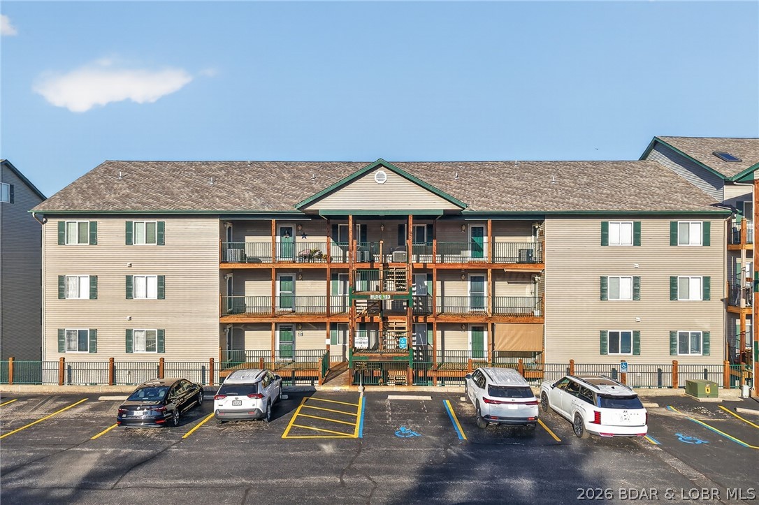 Cedar Glen is a coveted lake address, owners and thier guest enjoy the relaxed lake atmosphere, in a well managed and meticuously maintained project. This walk in unit is a rare find so don't wait. There's something for everyone, a playground for kids, sand volleyball court for active people, a Lakeside boardwalk and even music on summer weekends, or just relax on your lakeside east facing deck. Start off with Walkin unit no stairs to drag your groceries up. Level parking lot and big view. Well kept 2 bedroom 2 bath with fireplace comes with comfortable furniture, boat slip and hoist and 2 PWC Slips with lifts. Don't wait call for appointment and start having summer fun today.