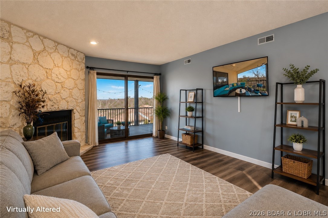 Updated 2 bedroom, 2 bath condo in the heart of Lake Ozark offering 1,527 sq ft. Access to the highly sought-after Four Seasons amenities. Whether you're looking for a weekend lake retreat, full-time residence, or investment property, this unit checks the boxes. Inside you’ll find luxury vinyl plank flooring, fresh paint, updated kitchen cabinets with pantry and breakfast nook, plus a spacious living area that opens to a screened deck. The primary suite features an updated walk-in shower and modern fixtures. Guest bedroom and hall bath provide comfortable space for family or renters. Short-term rentals are allowed, making this an attractive option for investors. Owners enjoy access to Four Seasons boat ramps, multiple community pools, playgrounds, dog park, campground, and three fishing lakes. Conveniently located near restaurants, golf, entertainment, and lake access.