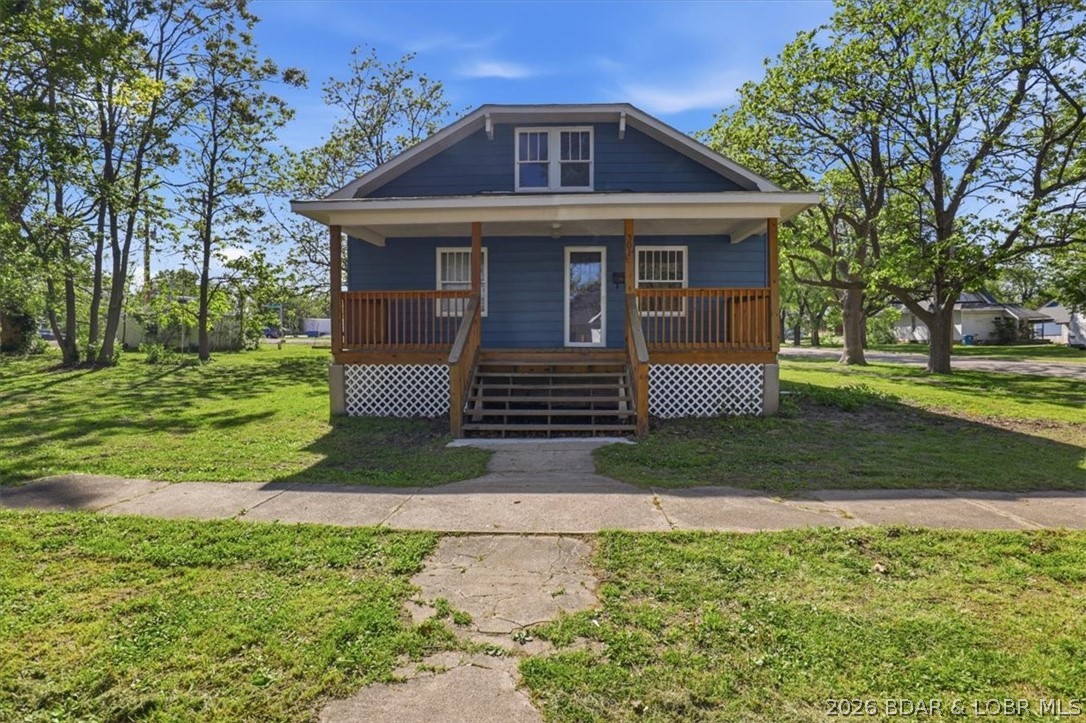 Full of character and timeless charm, this 2 bedroom, 1 bath home in Eldon is one you won’t want to miss! From the moment you walk through the front door, you’ll fall in love with the original hardwood floors, beautiful trim, and classic doors that give this home so much personality. The spacious kitchen features freshly painted cabinets, plenty of storage, open shelving, and stainless steel appliances. The main level offers an open dining and family room, two generously sized bedrooms, and a full bath complete with a soaker tub and walk-in shower. Upstairs, you’ll find a huge bonus room—perfect for a home office, den, gaming space, or additional storage. The full unfinished basement provides even more storage and houses the laundry area. Situated on a large corner lot and conveniently located close to everything Eldon has to offer, this home is the perfect blend of charm, space, and location! Schedule your showing today.