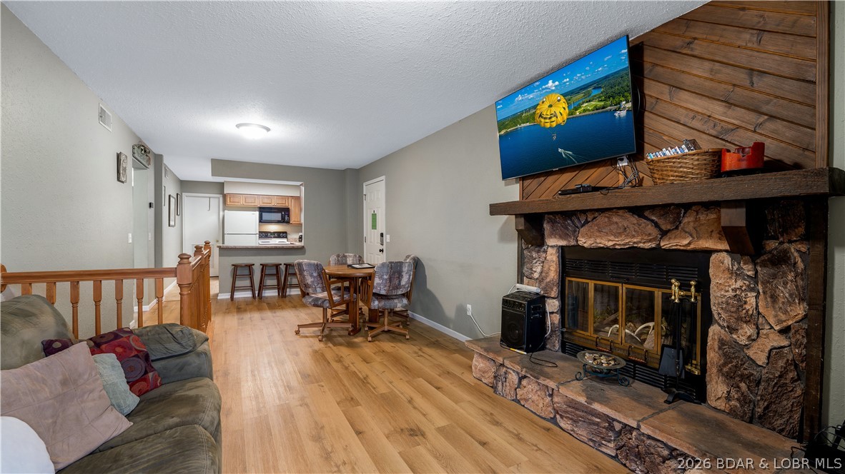 Experience one of the best locations at Lake of the Ozarks in the highly desirable HH area off Cherokee Road at the 4MM of the Osage Arm. This spacious 3-bedroom, 3-bath Wheel House Condominium features one of the largest floorplans in the complex with two levels of living space, making it ideal for full-time living, a vacation getaway, or an income-producing investment. Sold fully turnkey, this condo is ready to enjoy from day one or immediately place into a nightly rental program. The unit offers easy access with only a few steps from parking and is conveniently located near the community pool and the popular Dock Knockers Bar & Grill. By land or water, you are minutes from Camden on the Lake, Shady Gators, Sergio’s, Little Rizzo’s, Barn-B-Que, the Bagnell Dam Strip, shopping, entertainment, and more. A nearby marina offers convenient boat storage within walking distance. Nightly rentals are allowed, making this an outstanding opportunity in one of the Lake’s most sought-after areas. Seller is offering a $5,000 credit to the buyer at closing with an acceptable offer and successful closing.