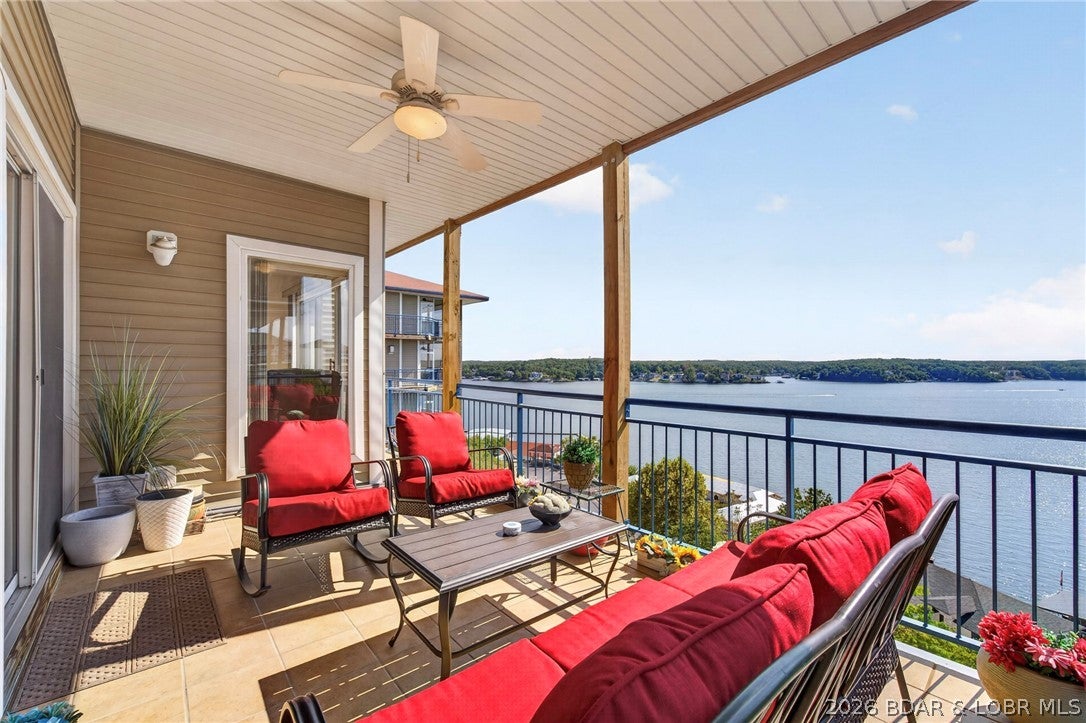 Experience easy lake living in The Palisades, a sought-after gated community on Horseshoe Bend. This beautifully furnished 3-bedroom, 2-bath condo offers stunning lake views, a spacious wraparound deck, and a comfortable, inviting interior designed for relaxing and entertaining. Offered turn-key with tasteful furnishings, this condo is ready to enjoy from day one. The open living area creates a welcoming gathering space, while the wraparound deck provides the perfect setting for morning coffee, afternoon relaxation, or evening sunsets overlooking the water. An assigned parking space directly in front of the unit adds exceptional convenience. Best of all, a 12 x 32 boat slip in Dock A is now included, making it easy to enjoy all that the Lake of the Ozarks has to offer. Located within convenient reach of restaurants, shopping, entertainment, and the Bagnell Dam Strip, this is an ideal lake getaway or full-time residence. Come see why The Palisades is such a desirable place to call home!