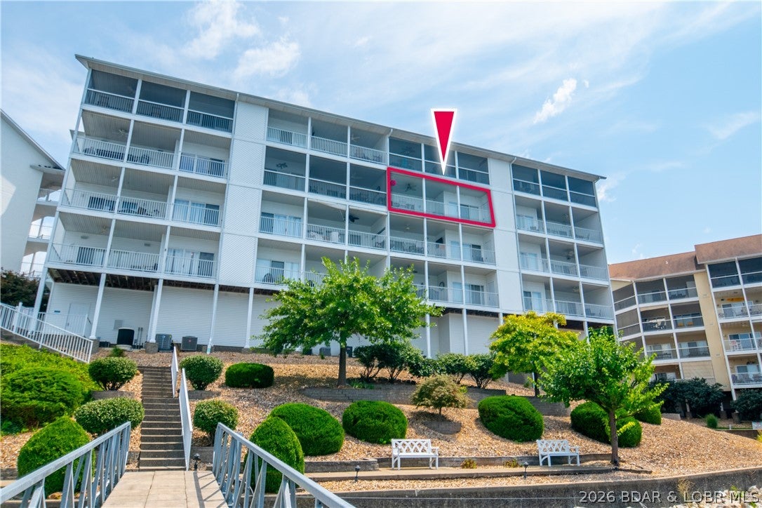 Why buy a tired condo when you can have one that feels like new—without the new-construction price tag? This beautifully updated 3-bedroom, 2-bath condo at Grandview Point puts you in the heart of Osage Beach at the 19 Mile Marker with cove protection and a fantastic main-channel view. Nearly everything has been refreshed, including paint, flooring, custom blinds, cabinetry, countertops, appliances, bathroom vanities and two gorgeous tiled showers. Even the water heater has been replaced! The spacious tiled deck provides the perfect place to relax and take in the view. Grandview Point is a smaller 36-unit complex offering an elevator, plenty of parking and an outstanding location near Dog Days, the new Oasis development, dining, shopping and entertainment. Better yet, this an excellent option for personal use, investment—or both. Sold furnished with attractive furnishings and complete with a coveted 14x36 boat slip, this condo is truly ready to enjoy from day one. Updated, furnished, big slip, great view and an incredible Osage Beach location—all for under $500,000. This is the one buyers should see before settling for the ordinary!
