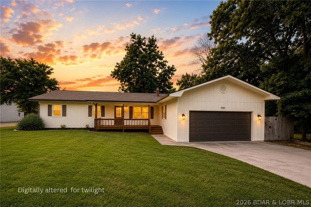 Freshly remodeled and move-in ready in the heart of Osage Beach! This 3-beddroom, 1-bath home has been refreshed inside and out for a fresh modern aesthetic, including a completely remodeled kitchen with new white shaker cabinetry, quartz countertops and stainless appliances, wide-plank wood-look laminate flooring, fresh interior finishes and updated lighting. Outside, enjoy a covered front porch, rear multi level deck, level yard, level driveway and attached oversized garage with storage and workshop area. HVAC and water heater updated in 2020. Conveniently located just minutes from shopping, dining, entertainment and everything Osage Beach has to offer, with city water and sewer and NO HOA. Whether you're looking for a full-time home, weekend getaway or investment property, this one is ready to go!